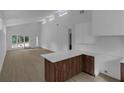 Bright and airy living room featuring wood floors, high ceilings, and large windows providing natural light at 998 Lookout Nw Ave, Atlanta, GA 30318