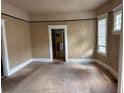 Neutral bedroom featuring light-filled windows and carpeted floor, offering a comfortable retreat at 389 Dargan Sw Pl, Atlanta, GA 30310