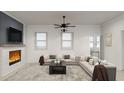 Comfortable living room with a fireplace, large sectional sofa, and abundant natural light at 1161 Dahlonega Hwy # 3, Cumming, GA 30040