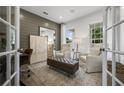 Stylish home office with natural light and desk space, perfect for remote work at 317 Foxglove Way, Mcdonough, GA 30253