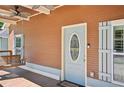 Charming front porch with a welcoming swing and a stylish blue front door at 999 Smith Sw St, Atlanta, GA 30310
