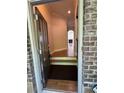 View of the foyer with hardwood floors, open doorway, and clear sightlines at 261 Cole Ne St, Marietta, GA 30060
