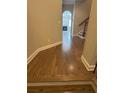 Inviting entryway with hardwood floors leading into the living area and staircase at 261 Cole Ne St, Marietta, GA 30060