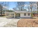 Charming single-story home with a covered carport and inviting front porch at 2826 Ben Hill Rd, Atlanta, GA 30344
