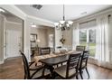 Charming dining room with a view to the entryway and features a dining table and natural light at 4305 Hunters Walk Way, Cumming, GA 30028