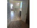 View of bathroom from bedroom showing tub and vanity at 1749 Misselthrush Ln, Mcdonough, GA 30253
