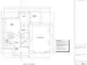 First floor plan highlighting the layout of the foyer, kitchen, living room, and a 3-car garage at 7947 Post Rd, Winston, GA 30187