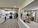 Open-concept living room with modern finishes and neutral decor at 1387 Renee Dr, Decatur, GA 30035