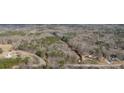 Overhead view showing the property and nearby creek at 176 Old Burnt Hickory Rd, Douglasville, GA 30134