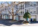 Exterior of townhomes, showcasing attached garages and well maintained landscaping at 1107 Park Row South Se, Atlanta, GA 30312