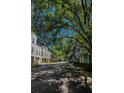 Street view of well maintained townhomes with green trees at 1107 Park Row South Se, Atlanta, GA 30312
