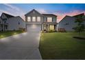 Charming two-story home with a well-manicured lawn and a two-car garage in a great neighborhood at 537 Garnet Dr, Acworth, GA 30101