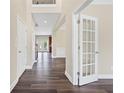 Bright foyer with wood-look flooring, showcasing an open floor plan and inviting entryway at 29 Lankford Rd, Tucker, GA 30084