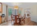 Charming dining area near a fireplace, perfect for gatherings at 1777 E Gate Trl, Stone Mountain, GA 30087