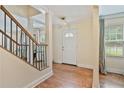 Inviting foyer with hardwood floors and staircase at 1777 E Gate Trl, Stone Mountain, GA 30087