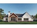 Back of this beautiful home featuring a cozy outdoor space with ample windows and natural light at 1779 Granade Sw Rd, Conyers, GA 30094
