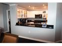 A modern kitchen featuring stainless steel appliances and sleek black countertops at 3475 Oak Valley Ne Rd # 980, Atlanta, GA 30326