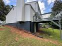 The backyard features a wood deck and a partial basement at 2691 Old South Dr, Jonesboro, GA 30236