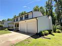 Beautiful home featuring an attached two-car garage and well-manicured landscaping at 2691 Old South Dr, Jonesboro, GA 30236