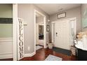 Inviting entryway with hardwood floors, neutral walls, and a view into other rooms, creating a warm and welcoming atmosphere at 2256 Long Bow Chase Nw, Kennesaw, GA 30144