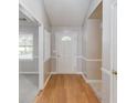 Inviting entryway with hardwood floors and fresh paint at 1980 Mcconnell Rd, Grayson, GA 30017
