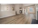 Open-concept living area showcasing modern flooring and seamless flow to the kitchen at 1501 Buckingham, Stockbridge, GA 30281