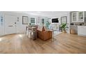 Inviting living room with hardwood floors, plantation shutters, and stylish furnishings at 70 Old Ivy Ne Rd # 57, Atlanta, GA 30342