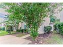 Attractive two-story home with lush landscaping and a long parking pad at 257 Turnstone Rd, Stockbridge, GA 30281