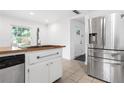 Bright kitchen featuring stainless steel appliances and butcher block countertop at 1844 Stanton St, Decatur, GA 30032