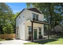 Modern two-story home with a well-kept lawn and unique architectural details at 1473 Lansing Se St, Atlanta, GA 30315
