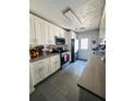 Bright kitchen features modern appliances and sleek countertops, ready for culinary adventures at 4312 Idlewood Ln, Tucker, GA 30084