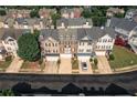 Aerial shot showcases the attractive townhome exteriors and well-maintained community at 6004 Turfway Park Ct, Sugar Hill, GA 30518