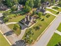 Suburban homes on large lots with mature landscaping in quiet neighborhood at 2900 Sutton Pl, Conyers, GA 30013