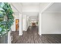 Spacious open-concept foyer with wood-look floors, leading to the living spaces at 1275 Kelly Nelson Dr, Lawrenceville, GA 30043