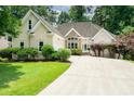 Charming one story home featuring manicured lawn and attractive stone accents near the front entrance at 1275 Kelly Nelson Dr, Lawrenceville, GA 30043
