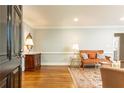 Inviting living room with hardwood floors, neutral paint, and natural light shining in at 2197 Fairway Ne Cir, Brookhaven, GA 30319