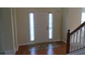 Spacious foyer with wood floors and natural light at 804 Bridle Cove, Stockbridge, GA 30281