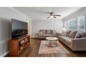Cozy living room with wood floors, large television, and comfortable seating at 1680 Bristol Ne Dr, Atlanta, GA 30329