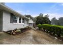 Charming split-level home featuring a well-manicured front yard and ample parking space at 3664 Pin Oak Cir, Atlanta, GA 30340