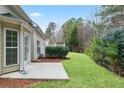 A view of the backyard and the surrounding area of trees at 184 Darbys Crossing Ct, Hiram, GA 30141