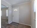 Bright entryway featuring a white door, complementing the neutral wall paneling at 2239 Carey Se Dr, Atlanta, GA 30315