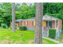 Picture of a single-story red brick home with a front porch at 2817 Burton Nw Rd, Atlanta, GA 30311