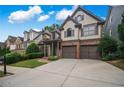 Beautiful two-story home with a two-car garage, lovely front yard and traditional design at 3725 Paces Park Se Cir, Smyrna, GA 30080