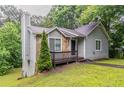 Attractive single-story home with stone detailing, tidy landscaping, and a welcoming entrance at 2654 Laurel View Dr, Snellville, GA 30039