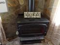 Close-up of a cozy fireplace, perfect for cold days at 3096 Campground Rd, Winston, GA 30187