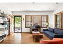 Bright living room with hardwood floors, stylish furniture, and a cozy atmosphere at 1195 Russell Dr, Decatur, GA 30030
