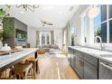 Open-concept living room featuring hardwood floors, and plenty of natural light at 260 2Nd St, Fayetteville, GA 30214