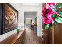Elegant entryway featuring hardwood floors, console table, and a glimpse into the open living space at 4137 Avid Park, Marietta, GA 30062