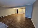 Spacious living room featuring durable floors and neutral wall colors at 6002 Pat Mell Se Pl, Smyrna, GA 30080