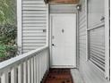 Exterior entryway with white door, trim, and a 'Wipe Your Paws' welcome mat at 1931 Brian Way, Decatur, GA 30033